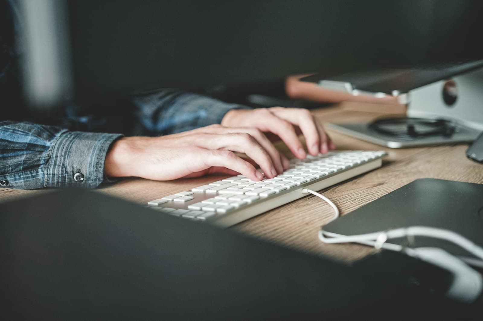 Software engineer typing on keyboard
